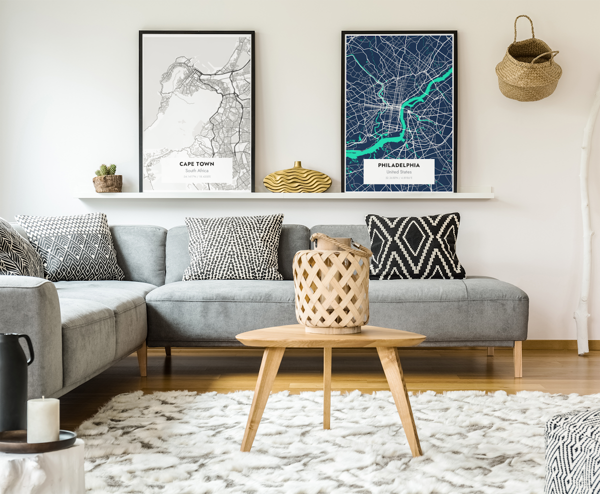 Living room with 2 Topo.ink map posters of Cape Town and Philadelphia